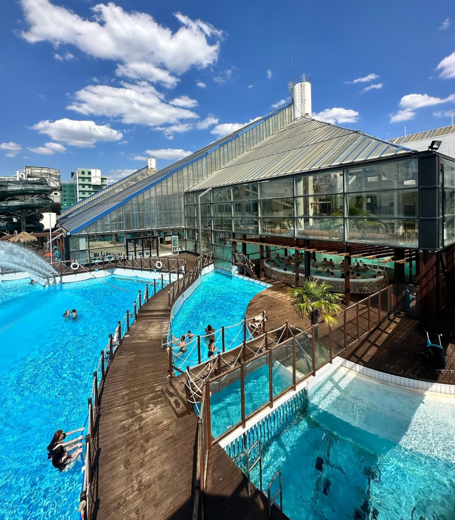 Outdoor swimming pool with blue water and blue skies